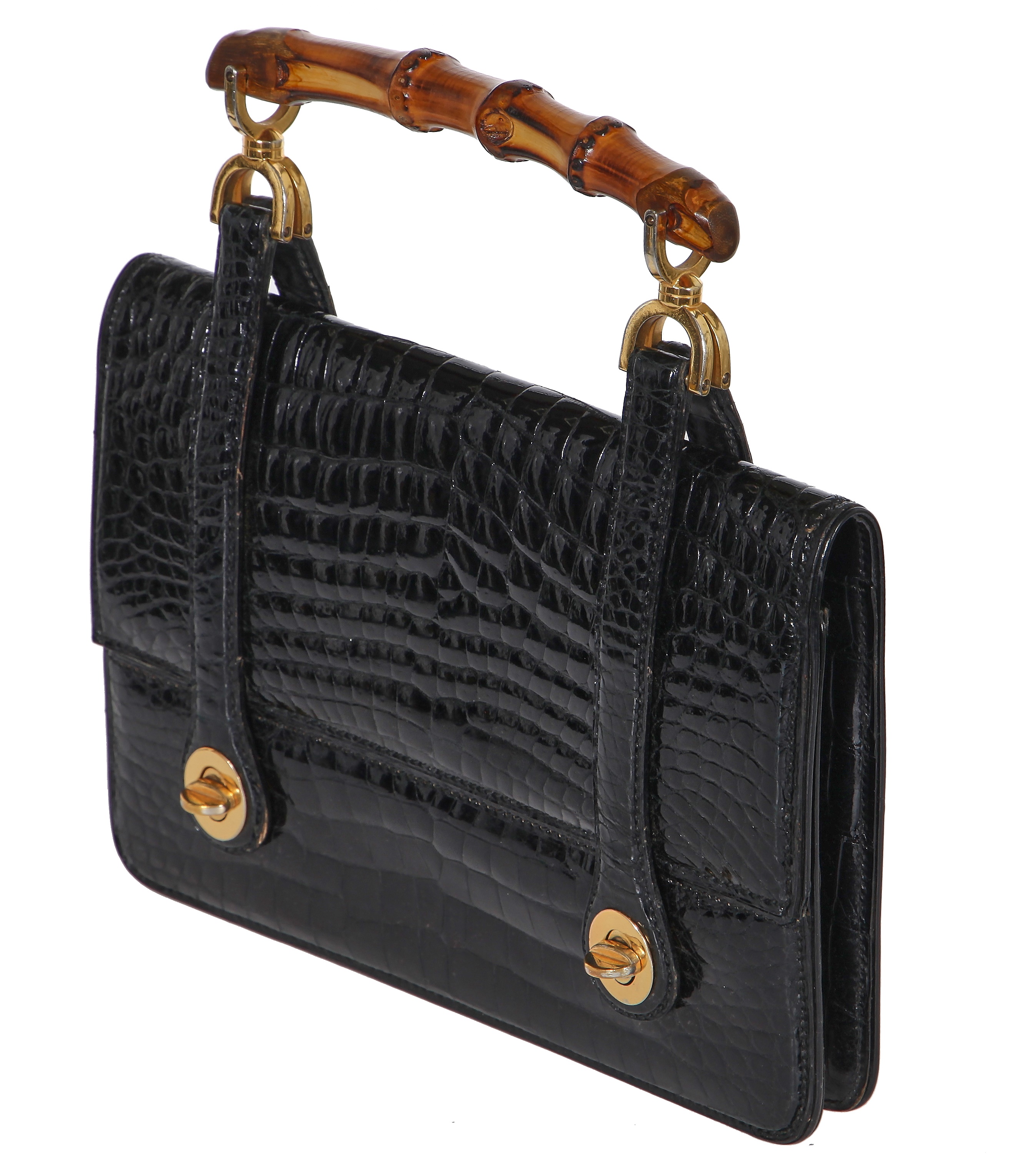 Lot 43 A Gucci black crocodile handbag 1960s