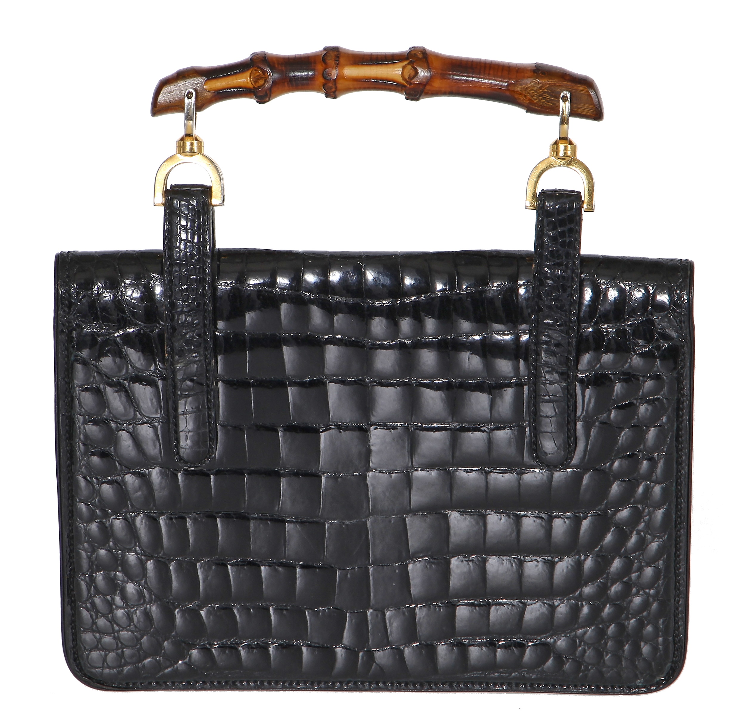 Lot 43 A Gucci black crocodile handbag 1960s