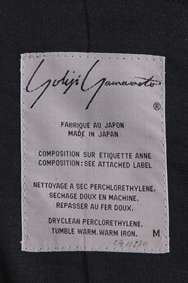 Lot 138 - A Yohji Yamamoto military-inspired black wool blend jacket, Autumn-Winter 1988-89
