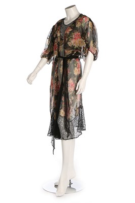 Lot 275 - A floral printed chiffon and lace gown, mid...