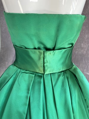 Lot 255 - A Christian Dior couture emerald-green satin ballgown, 'Soirée à Londres' model, 'Y' line, Autumn-Winter 1955-56