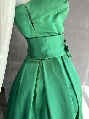 Lot 255 - A Christian Dior couture emerald-green satin ballgown, 'Soirée à Londres' model, 'Y' line, Autumn-Winter 1955-56