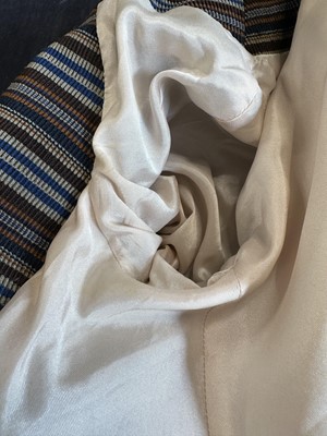 Lot 71 - A Vivienne Westwood striped and ribbed wool suit, 'Dressed to Scale' collection, Autumn-Winter 1998-99