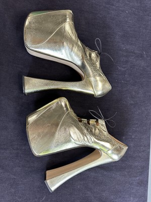 Lot 74 - A pair of Vivienne Westwood gold-leather Super Elevated Ghillie platform shoes, 2001