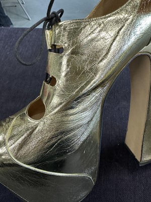 Lot 74 - A pair of Vivienne Westwood gold-leather Super Elevated Ghillie platform shoes, 2001