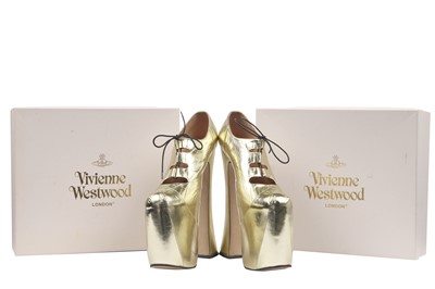 Lot 74 - A pair of Vivienne Westwood gold-leather Super Elevated Ghillie platform shoes, 2001