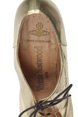 Lot 74 - A pair of Vivienne Westwood gold-leather Super Elevated Ghillie platform shoes, 2001