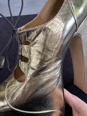 Lot 74 - A pair of Vivienne Westwood gold-leather Super Elevated Ghillie platform shoes, 2001