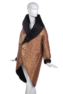 Lot 401 - A Jean Paul Gaultier quilted gold satin coat, Autumn-Winter 1985