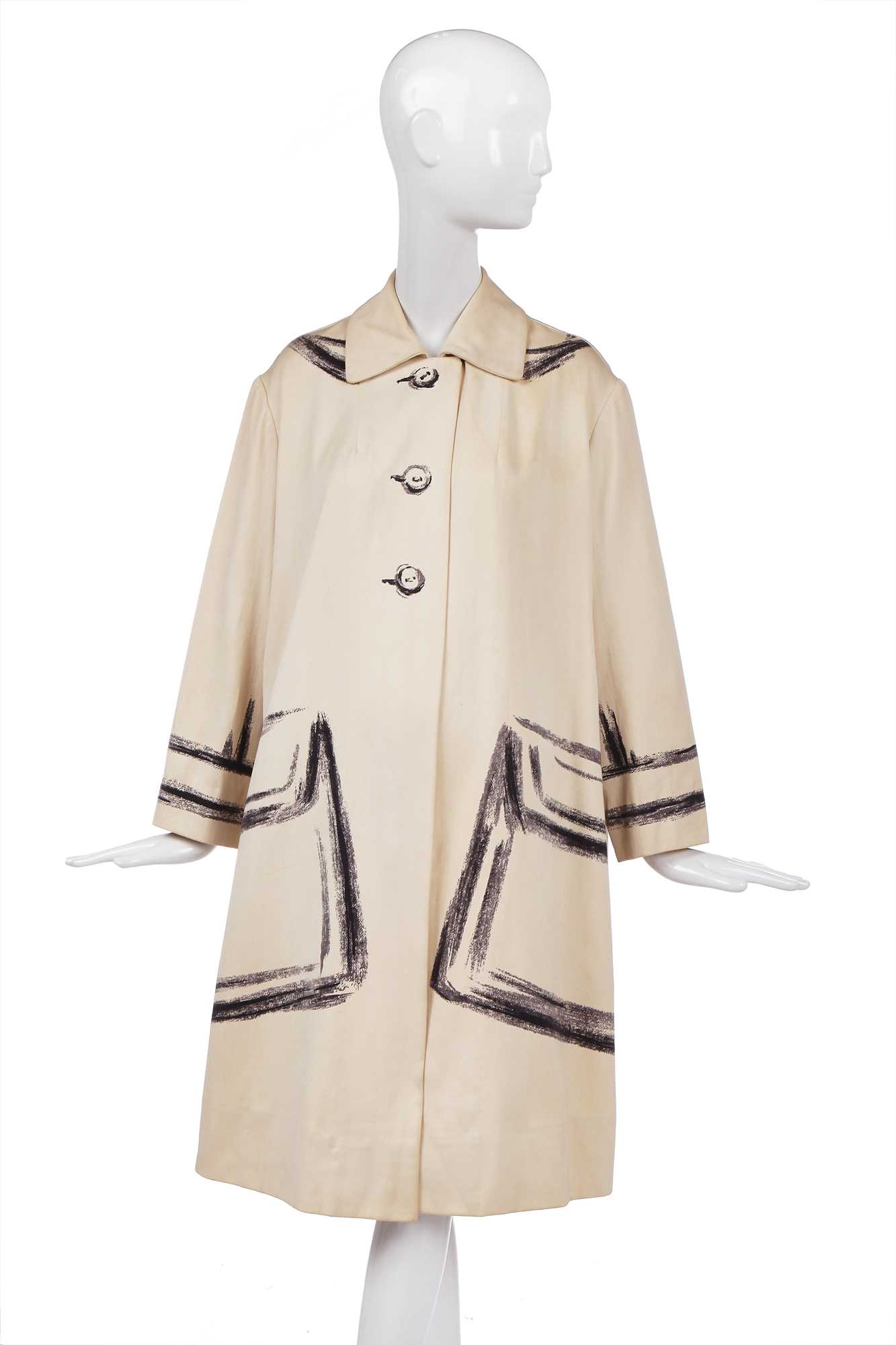 Lot 247 - A rare Hermès trompe l'oeil ivory wool coat, 1951