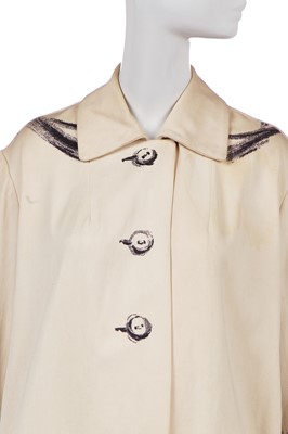 Lot 247 - A rare Hermès trompe l'oeil ivory wool coat, 1951