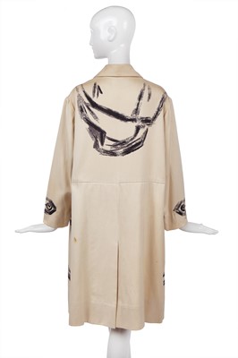 Lot 247 - A rare Hermès trompe l'oeil ivory wool coat, 1951