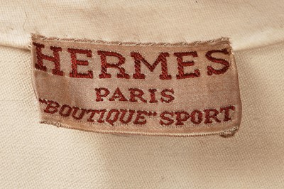 Lot 247 - A rare Hermès trompe l'oeil ivory wool coat, 1951