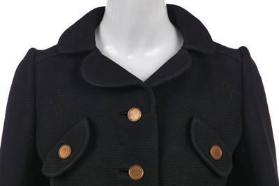 Lot 289 - A Courrèges black wool suit, 1968