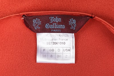 Lot 120 - A John Galliano bias-cut terracotta satin-backed crêpe evening gown, 'Ballets Russes', Spring-Summer 1999-2000