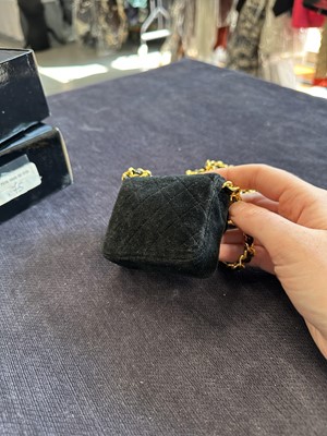 Lot 177 - A Chanel micro-mini quilted velvet handbag-necklace, circa 1987