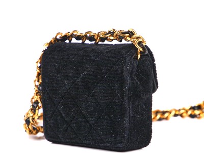 Lot 177 - A Chanel micro-mini quilted velvet handbag-necklace, circa 1987
