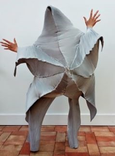 Lot 536 - A rare Issey Miyake pleated silver polyester ensemble, Autumn-Winter 1999
