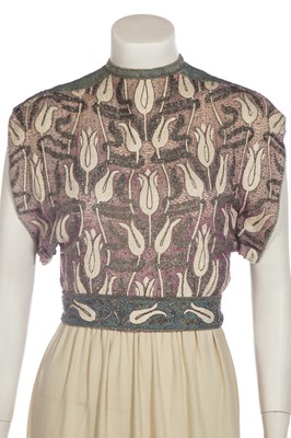 Lot 341 - A Givenchy couture Ottoman-tulip motif embroidered ivory silk dress, circa 1975
