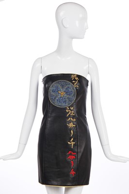 Lot 416 - A Gianni Versace couture black leather mini-sheath, 'Byzantium' collection, Autumn-Winter, 1997-98