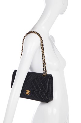 Lot 178 - A Chanel quilted black lambskin leather classic double flap bag, 2000-2002