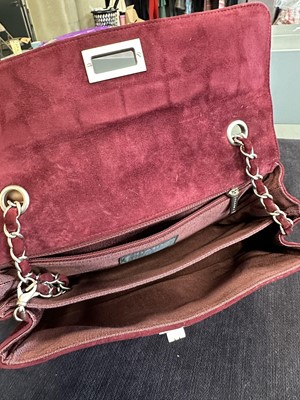 Lot 162 - A Chanel square-quilted burgundy suede flap bag, 2000-2002