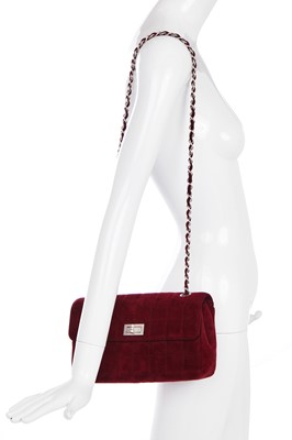 Lot 162 - A Chanel square-quilted burgundy suede flap bag, 2000-2002