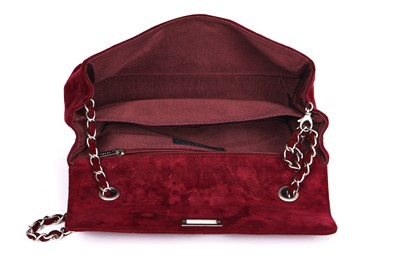 Lot 162 - A Chanel square-quilted burgundy suede flap bag, 2000-2002