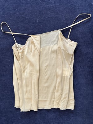 Lot 170 - A Chanel red and gold tweed ensemble, Autumn-Winter 2000-01