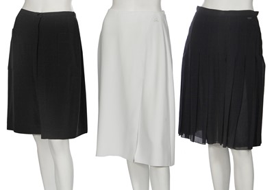 Lot 10 - Three Chanel skirts and four pairs of trousers, 2000-2002