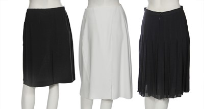 Lot 10 - Three Chanel skirts and four pairs of trousers, 2000-2002