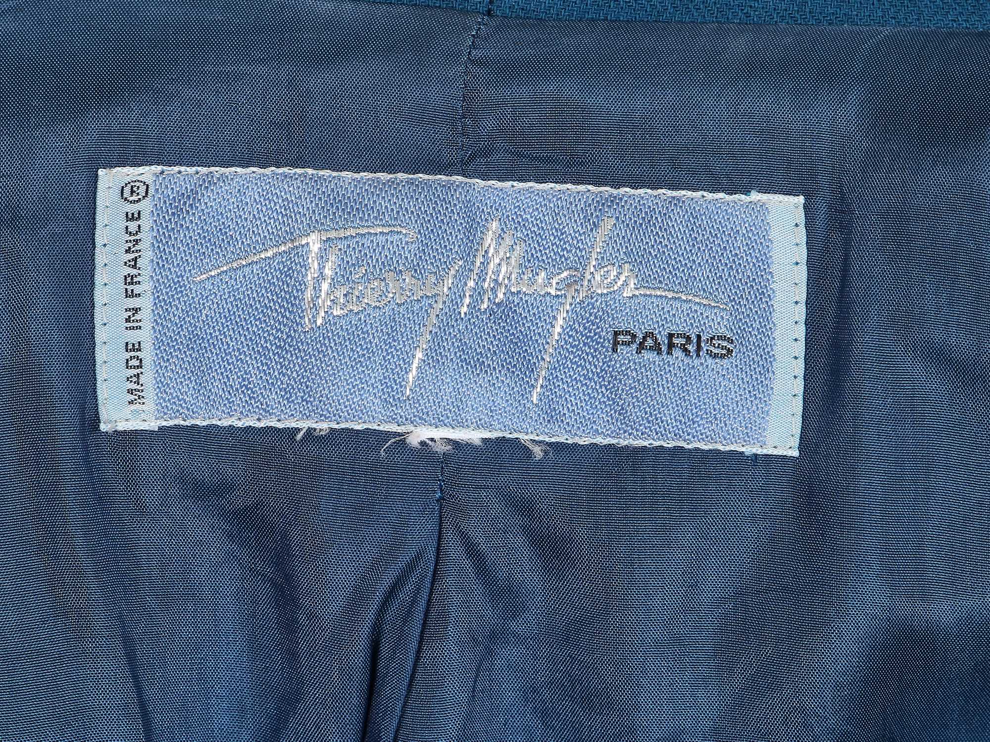 Lot 141 - A Thierry Mugler blue wool suit, 1990s,