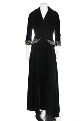 Lot 383 - A Maison Worth beaded black velvet evening dress, late 1940s-early 50s