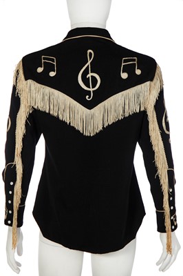 Lot 272 - A Fay Ward man's black wool twill fringed shirt with musical notes