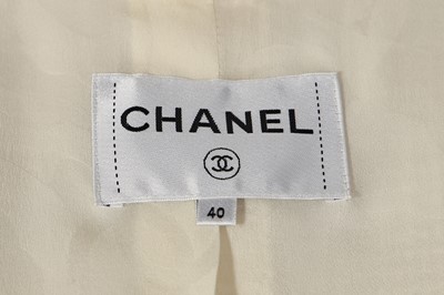 Lot 18 - A Chanel off-white tweed cropped jacket, 2019