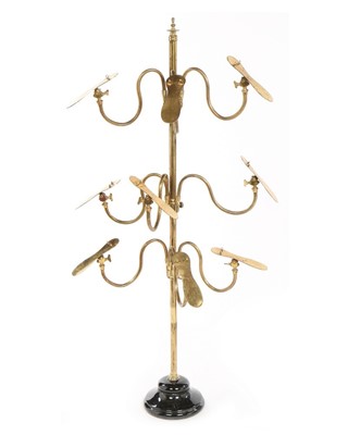 Lot 309 - A brass shoe 'tree' shop display, 1887,...