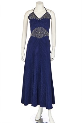 Lot 384 - A beaded blue faille moiré cocktail dress, 1940s