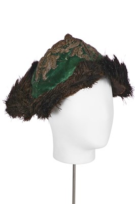 Lot 432 - An unusual gentleman's green satin undress hat, possibly Russian, early 18th century