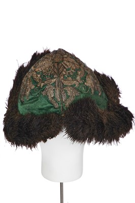 Lot 432 - An unusual gentleman's green satin undress hat, possibly Russian, early 18th century
