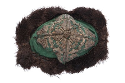 Lot 432 - An unusual gentleman's green satin undress hat, possibly Russian, early 18th century