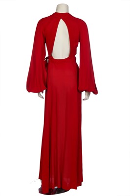 Lot 306 - An Ossie Clark red moss crêpe 'Cuddly' wrap-over dress, mid 1970s