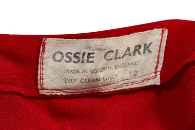 Lot 306 - An Ossie Clark red moss crêpe 'Cuddly' wrap-over dress, mid 1970s