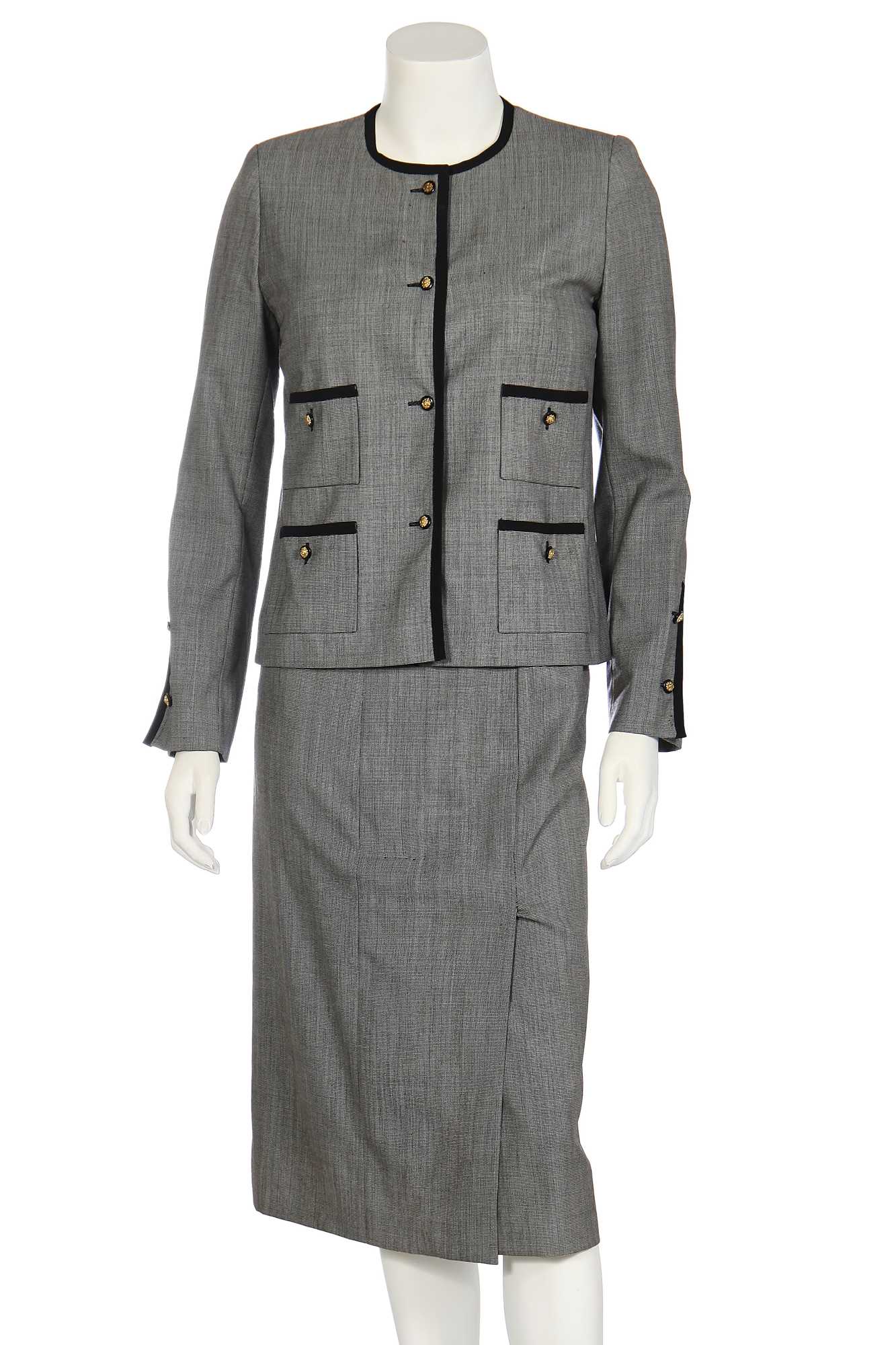 Lot 29 - A Chanel grey wool summer suit, late 1980s