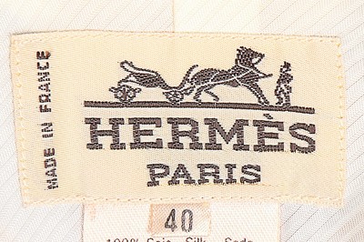 Lot 26 - An Hermès 'Brides de Gala' printed silk jacket,...
