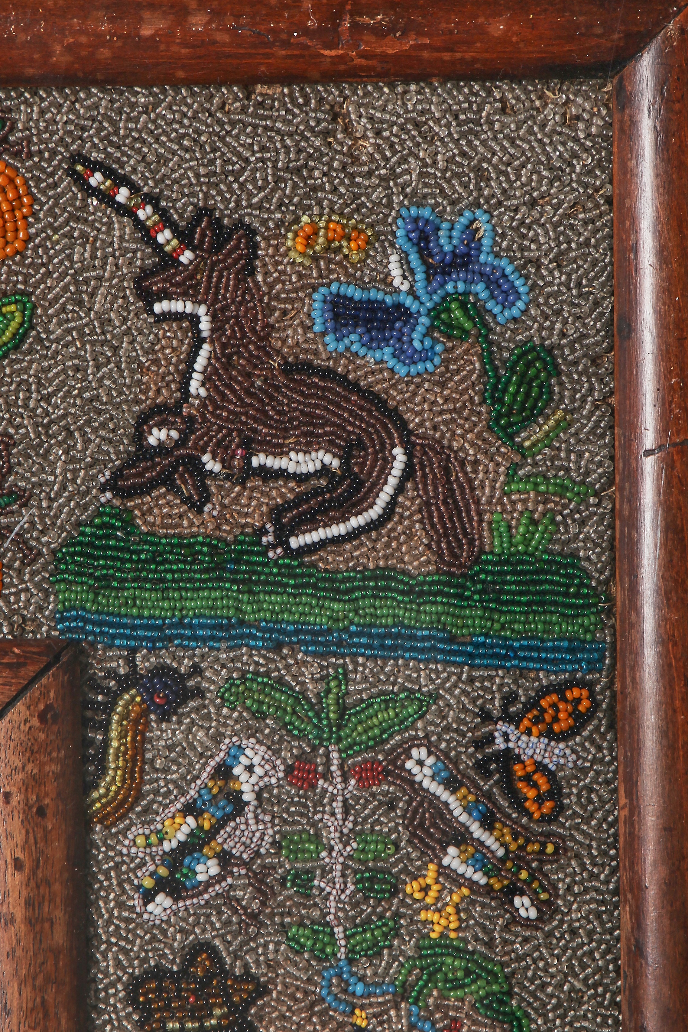 Lot 63 - A fine Charles II beadwork mirror, the