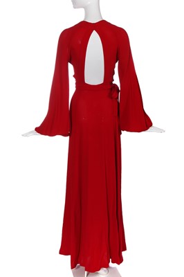 Lot 164 - An Ossie Clark red moss crêpe 'Cuddly' wrap-over dress, mid 1970s