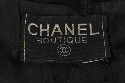 Lot 23 - A Chanel black wool suit, circa 1992