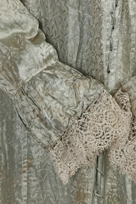 Lot 486 - A morning dress of seafoam-green figured silk, 1810s