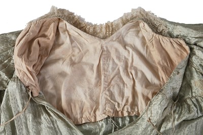 Lot 486 - A morning dress of seafoam-green figured silk, 1810s