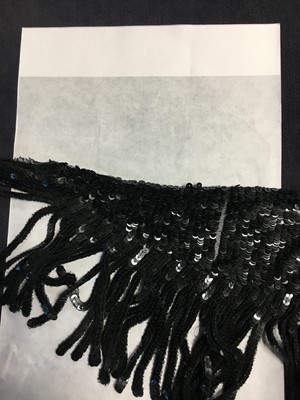 Lot 86 - A couture black sequined shawl, attributed to Chanel, 1935